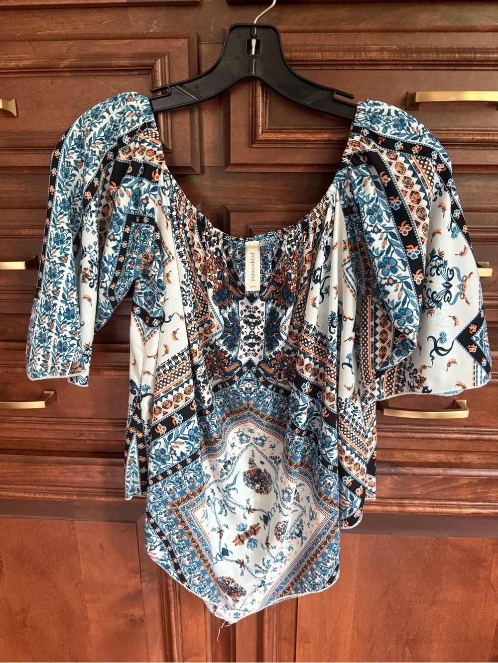 Peppermint Off-Shoulder Boho Blouse in Blue and Cream with Rust Accents